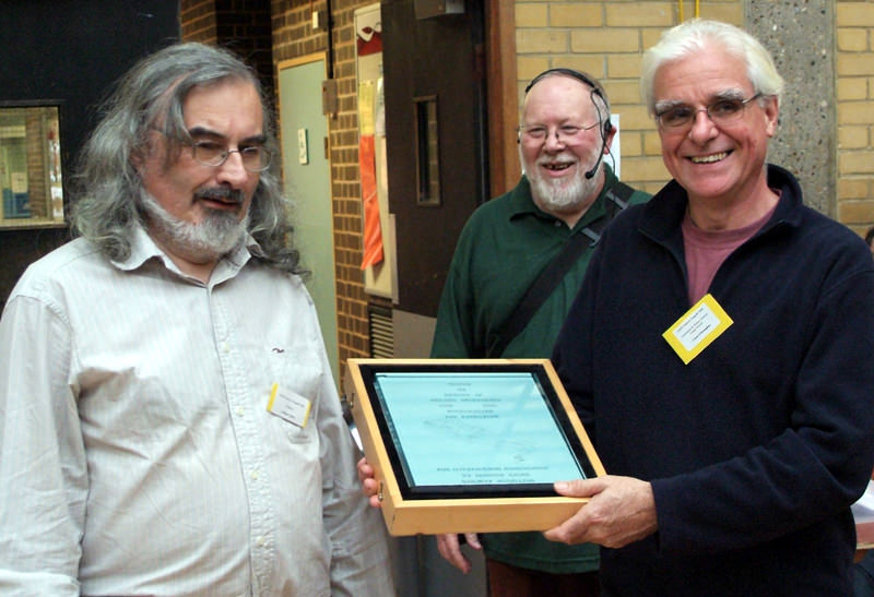 Brian Taylor is presented the 2006 Reinier Hendriksen Trophy by Chris O'Donoghue